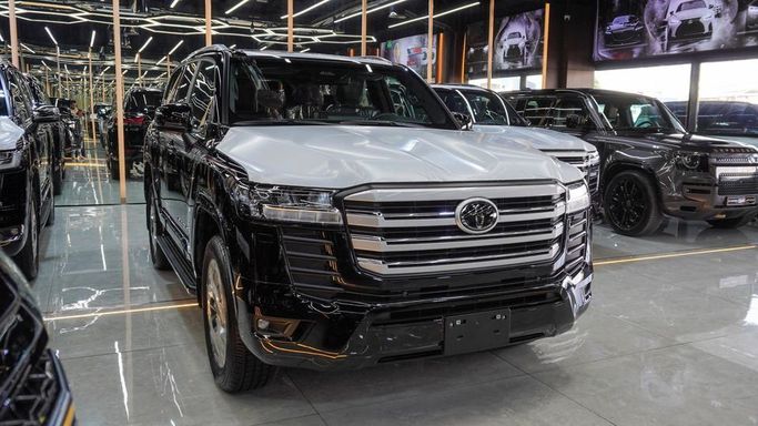 New Toyota Land Cruiser 300 Series, 4.0 l, 2025 in Dubai by Najem Motors, Black color. GCC Specs | AUTO.AE