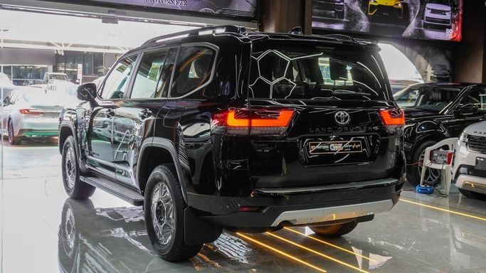 New Toyota Land Cruiser 300 Series, 3.4 l, 2025 in Dubai by Najem Motors, Black color. GCC Specs | AUTO.AE