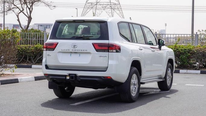 New Toyota Land Cruiser 300 Series, 3.4 l, 2024 in Dubai by Najem Motors, White color. GCC Specs | AUTO.AE