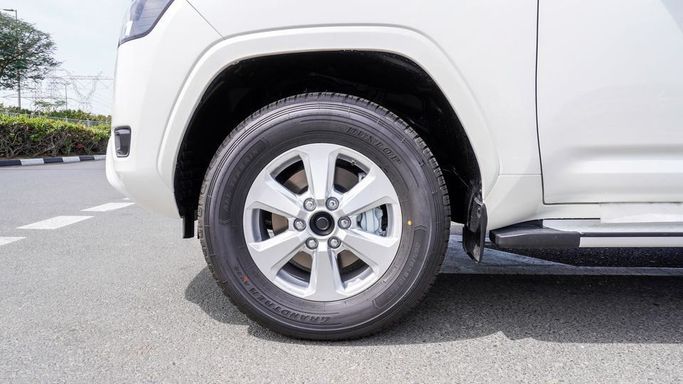 New Toyota Land Cruiser 300 Series, 3.4 l, 2024 in Dubai by Najem Motors, White color. GCC Specs | AUTO.AE
