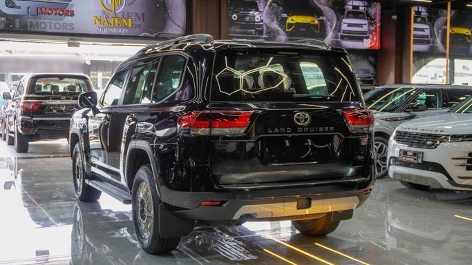 New Toyota Land Cruiser 300 Series, 3.4 l, 2024 in Dubai by Najem Motors, Black color. GCC Specs | AUTO.AE