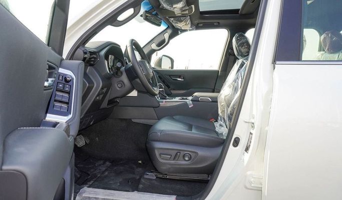 New Toyota Land Cruiser 300 Series, 3.4 l, 2024 in Dubai by Najem Motors, White color. GCC Specs | AUTO.AE
