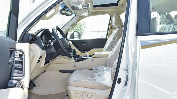 New Toyota Land Cruiser 300 Series, 4.0 l, 2024 in Dubai by Najem Motors, White color. GCC Specs | AUTO.AE