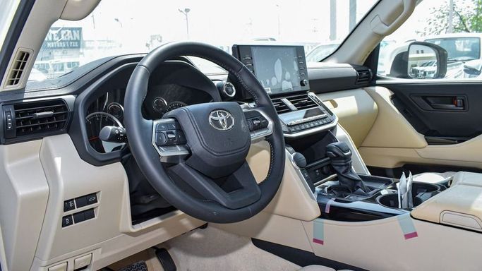 New Toyota Land Cruiser 300 Series, 4.0 l, 2024 in Dubai by Najem Motors, White color. GCC Specs | AUTO.AE
