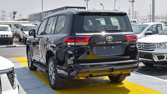 New Toyota Land Cruiser 300 Series, 4.0 l, 2024 in Dubai by Najem Motors, Black color. GCC Specs | AUTO.AE