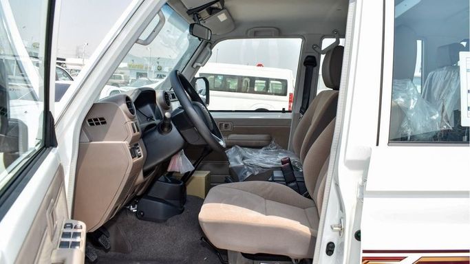 New Toyota Land Cruiser 70 Series Facelift 2, 4.5 l, 2024 in Dubai by Najem Motors, White color. GCC Specs | AUTO.AE