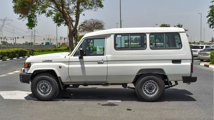 New Toyota Land Cruiser 70 Series Facelift, 4.5 l, 2023 in Dubai by Najem Motors, White color. GCC Specs | AUTO.AE