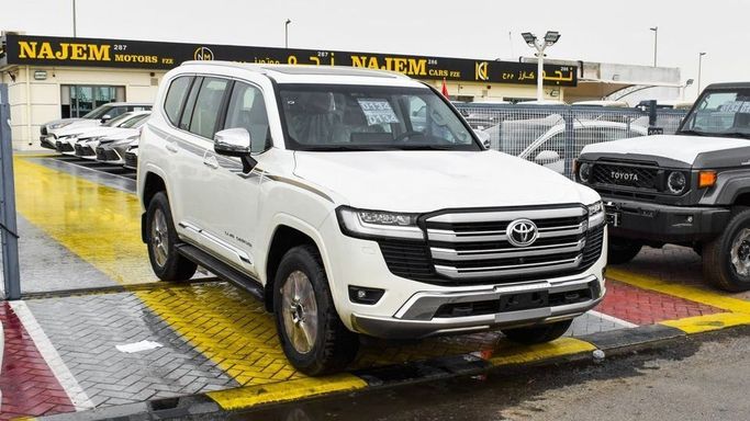 New Toyota Land Cruiser 300 Series, 3.4 l, 2023 in Dubai by Najem Motors, White color. GCC Specs | AUTO.AE
