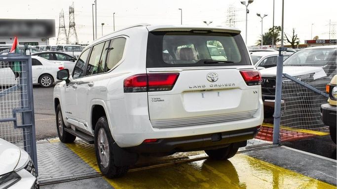 New Toyota Land Cruiser 300 Series, 3.4 l, 2023 in Dubai by Najem Motors, White color. GCC Specs | AUTO.AE