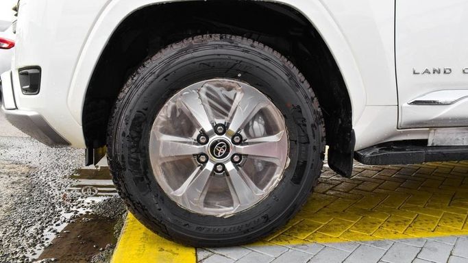 New Toyota Land Cruiser 300 Series, 3.4 l, 2023 in Dubai by Najem Motors, White color. GCC Specs | AUTO.AE