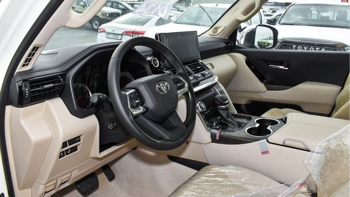 New Toyota Land Cruiser 300 Series, 3.4 l, 2023 in Dubai by Najem Motors, White color. GCC Specs | AUTO.AE