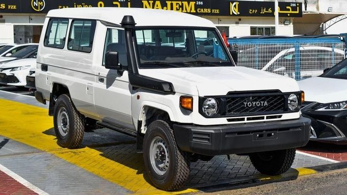 New Toyota Land Cruiser 70 Series Facelift 2, 2.8 l, 2024 in Dubai by Najem Motors, White color. GCC Specs | AUTO.AE