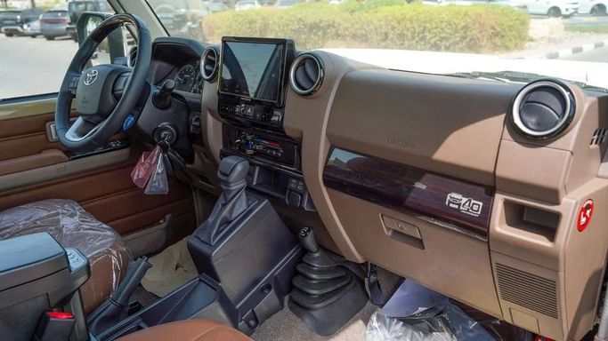 New Toyota Land Cruiser 70 Series Facelift 2, 4.5 l, 2024 in Dubai by Najem Motors, Beige color. GCC Specs | AUTO.AE