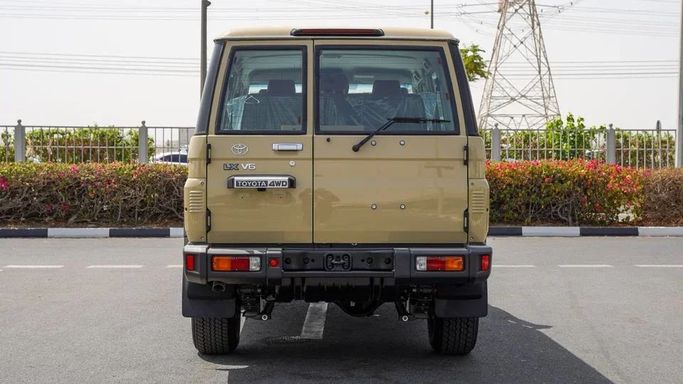 New Toyota Land Cruiser 70 Series Facelift 2, 4.5 l, 2024 in Dubai by Najem Motors, Beige color. GCC Specs | AUTO.AE