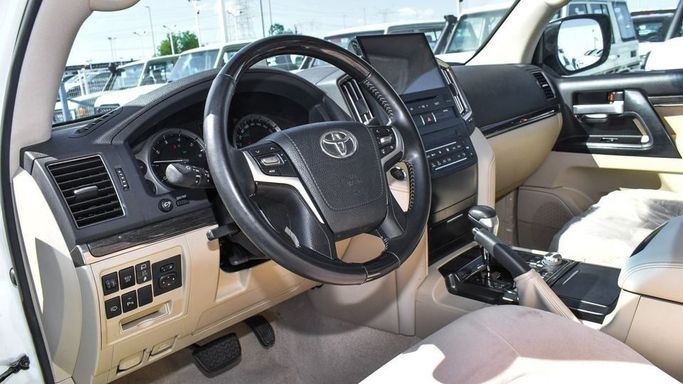 New Toyota Land Cruiser 200 Series Facelift 2, 4.0 l, 2021 in Dubai by Najem Motors, White color. GCC Specs | AUTO.AE