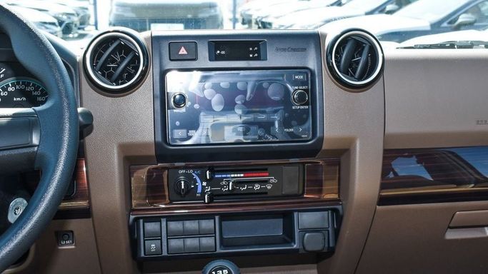 New Toyota Land Cruiser 70 Series Facelift 2, 4.0 l, 2024 in Dubai by Najem Motors, Beige color. GCC Specs | AUTO.AE