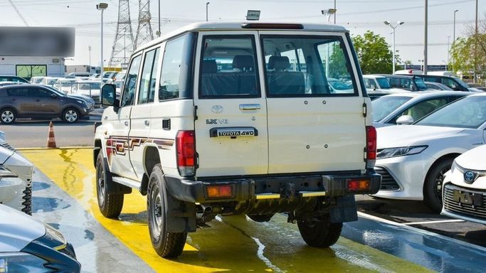 New Toyota Land Cruiser 70 Series Facelift 2, 4.5 l, 2024 in Dubai by Najem Motors, White color. GCC Specs | AUTO.AE