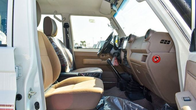 New Toyota Land Cruiser 70 Series Facelift 2, 4.5 l, 2024 in Dubai by Najem Motors, White color. GCC Specs | AUTO.AE