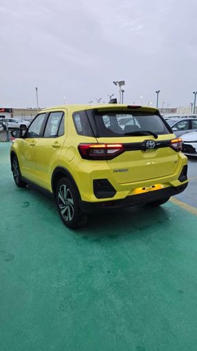 New Toyota Raize I, 996 l, 2023 in Dubai by Mohamed Hakim Motors, Yellow color. GCC Specs | AUTO.AE