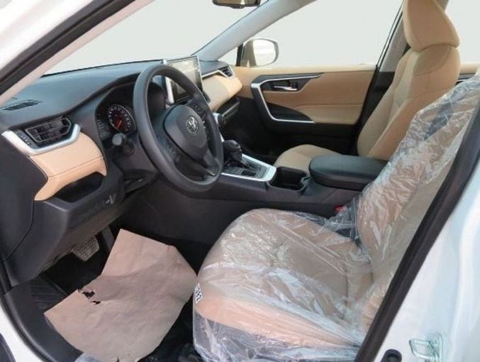 New Toyota RAV4 V (XA50), 2.5 l, 2023 in Dubai by Mohamed Hakim Motors, White color. GCC Specs | AUTO.AE