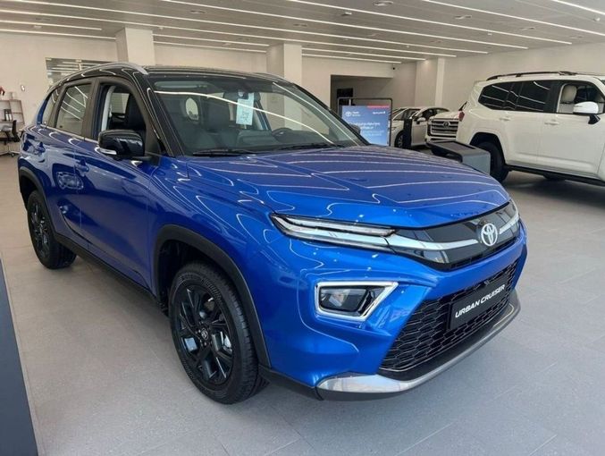 New Toyota Urban Cruiser III, 1.5 l, 2023 in Dubai by Mohamed Hakim Motors, Blue color. GCC Specs | AUTO.AE