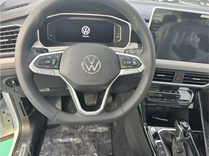 Новый Volkswagen Tayron I Рестайлинг, 1.4 л, 2024 в Дубае от Mohamed Hakim Motors Белый цвет. Китайская | AUTO.AE