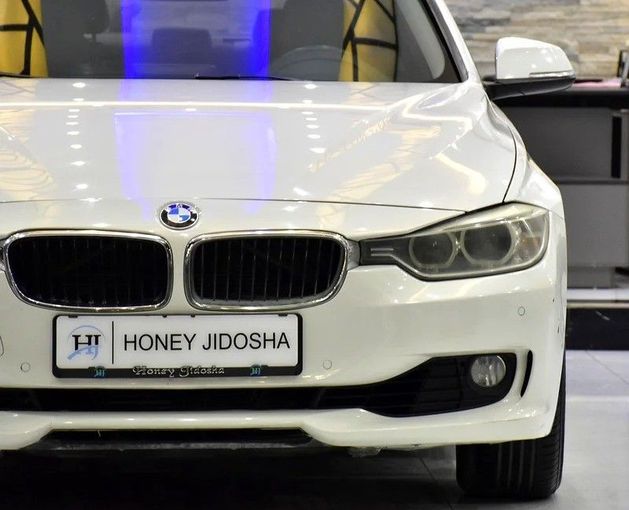 Used BMW 3 Series 320i VI (F3x), 2.0 l, 2014 in Sharjah by Honey Gidosha Used Cars Tr., White color. GCC Specs | AUTO.AE