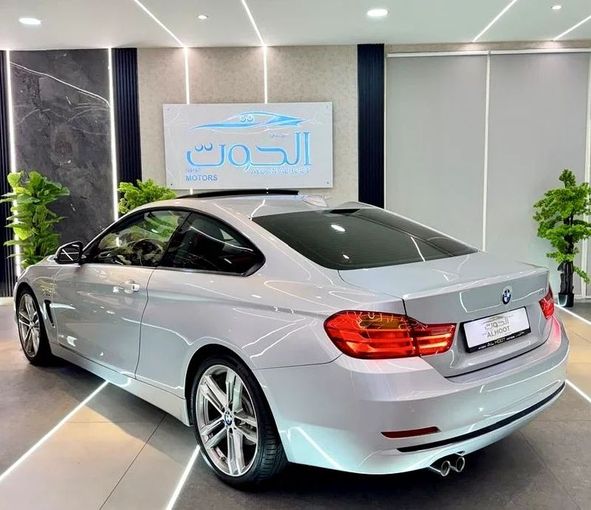 Used BMW 4 Series 430i F32/F33/F36, 2.0 l, 2016 in Sharjah by Ayoon Alhoot Motors, Silver color. GCC Specs | AUTO.AE