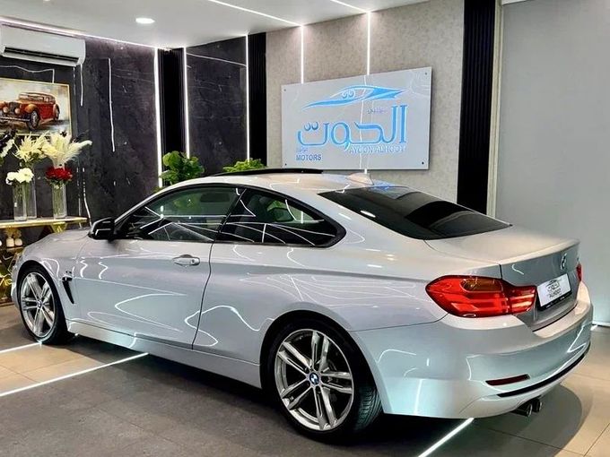 Used BMW 4 Series 430i F32/F33/F36, 2.0 l, 2016 in Sharjah by Ayoon Alhoot Motors, Silver color. GCC Specs | AUTO.AE