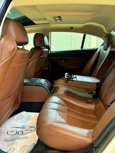 Подержанный BMW 6 Series 650i xDrive III (F06/F13/F12), 4.4 л, 2014 в Шардже от Ayoon Alhoot Motors Белый цвет. GCC | AUTO.AE
