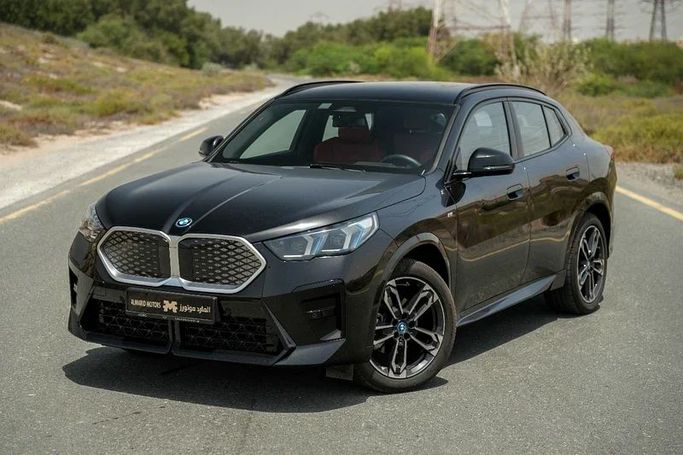 Подержанный BMW iX2, 2024 в Шардже от Almarid Motors Черный цвет. GCC | AUTO.AE