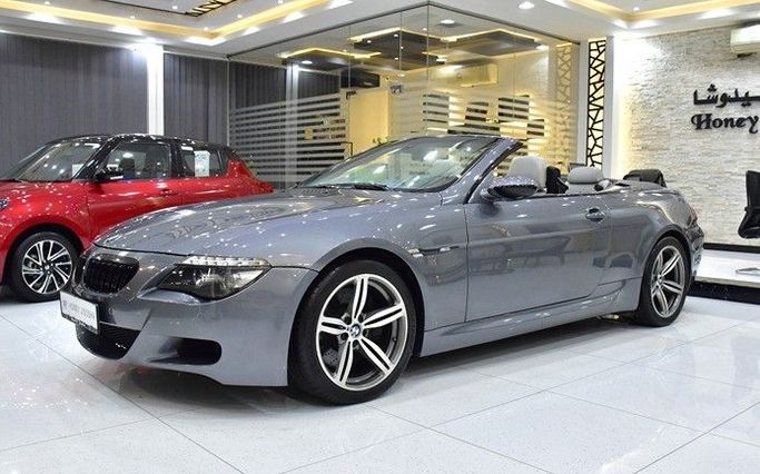 Подержанный BMW M6 II (E63/E64), 5.0 л, 2008 в Шардже от Honey Gidosha Used Cars Tr. Серый цвет.  | AUTO.AE