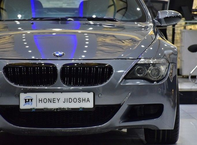 Подержанный BMW M6 II (E63/E64), 5.0 л, 2008 в Шардже от Honey Gidosha Used Cars Tr. Серый цвет.  | AUTO.AE