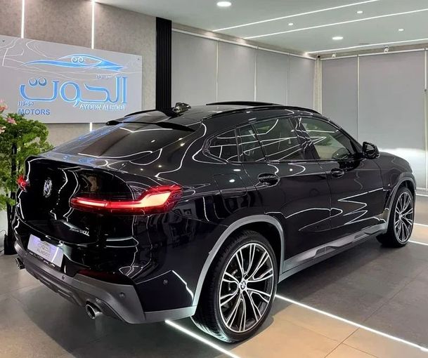 Used BMW X4 M40i II (G02) Facelift, 3.0 l, 2022 in Sharjah by Ayoon Alhoot Motors, Black color. GCC Specs | AUTO.AE