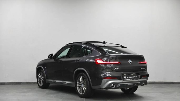 Подержанный BMW X4 20i II (G02), 2.0 л, 2020 в Шардже от Al Qassem Cars Trading Черный цвет. Корейская | AUTO.AE
