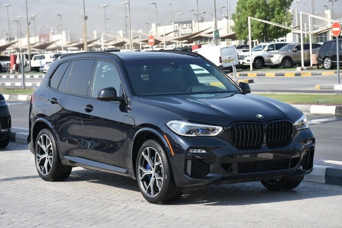 Подержанный BMW X5 45e IV (G05/G18), 3.0 л, 2021 в Шардже от Alfaris Used Cars Синий цвет.  | AUTO.AE