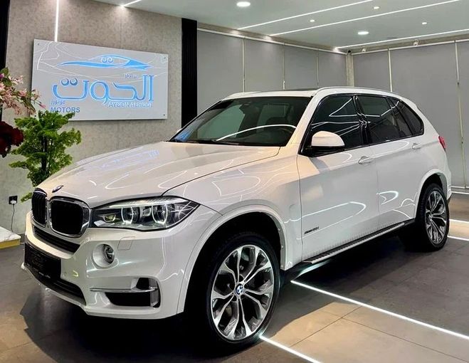 Used BMW X5 50i III (F15), 4.4 l, 2015 in Sharjah by Ayoon Alhoot Motors, White color. GCC Specs | AUTO.AE