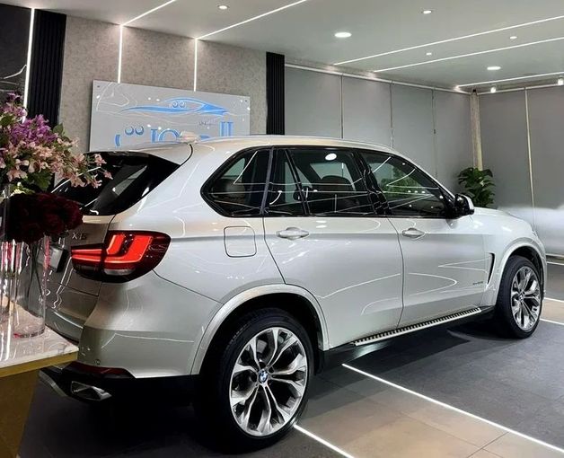 Used BMW X5 50i III (F15), 4.4 l, 2017 in Sharjah by Ayoon Alhoot Motors, Golden color. GCC Specs | AUTO.AE