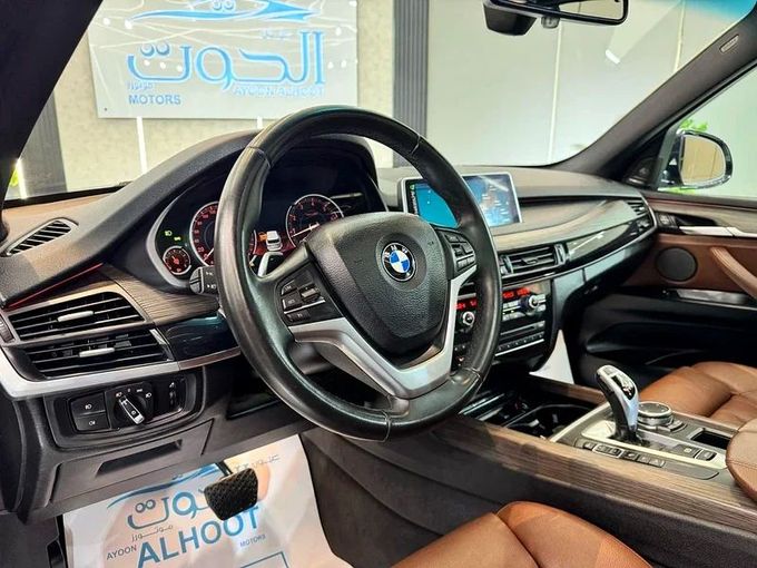 Used BMW X5 50i III (F15), 4.4 l, 2017 in Sharjah by Ayoon Alhoot Motors, Golden color. GCC Specs | AUTO.AE