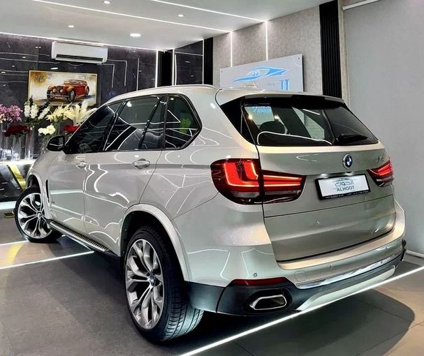 Used BMW X5 50i III (F15), 4.4 l, 2017 in Sharjah by Ayoon Alhoot Motors, Golden color. GCC Specs | AUTO.AE