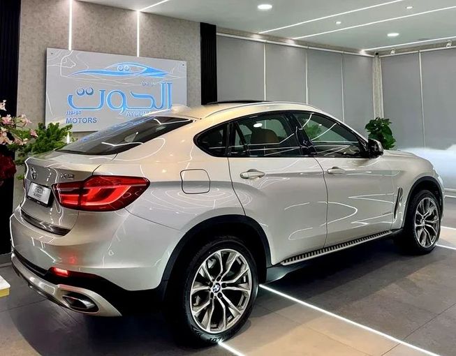 Used BMW X6 50i II (F16), 4.4 l, 2016 in Sharjah by Ayoon Alhoot Motors, Golden color. GCC Specs | AUTO.AE