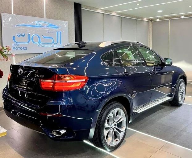 Подержанный BMW X6 35i I (E71) Рестайлинг, 3.0 л, 2014 в Шардже от Ayoon Alhoot Motors Синий цвет. GCC | AUTO.AE