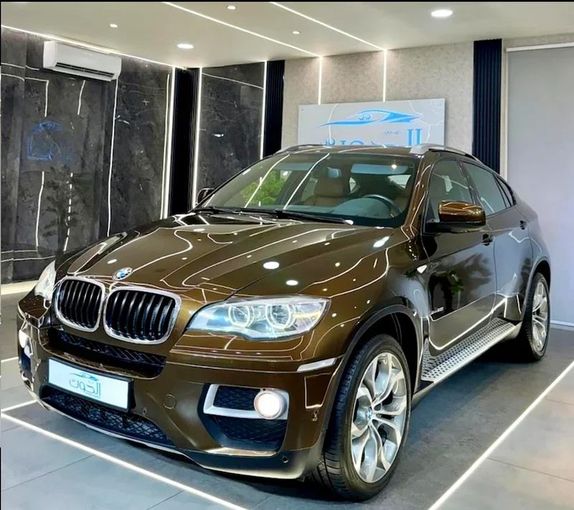 Used BMW X6 35i II (F16), 3.0 l, 2014 in Sharjah by Ayoon Alhoot Motors, Bronze color. GCC Specs | AUTO.AE