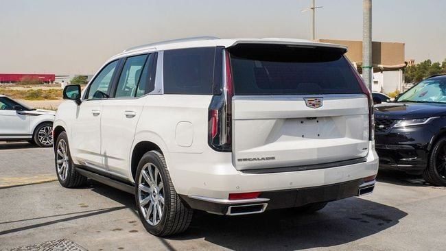 Used Cadillac Escalade V, 6.2 l, 2021 in Sharjah by Alnujoom Al Malakiah Used Cars, White color. GCC Specs | AUTO.AE