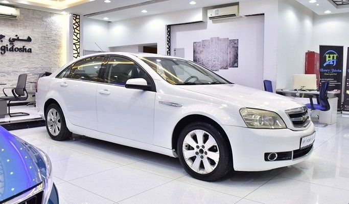 Used Chevrolet Caprice VI, 3.6 l, 2009 in Sharjah by Honey Gidosha Used Cars Tr., White color.  | AUTO.AE