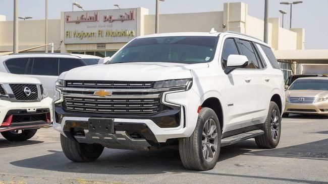 Used Chevrolet Tahoe V, 5.3 l, 2021 in Sharjah by Alnujoom Al Malakiah Used Cars, White color. GCC Specs | AUTO.AE