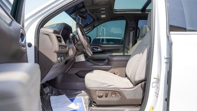 Used Chevrolet Tahoe V, 5.3 l, 2021 in Sharjah by Alnujoom Al Malakiah Used Cars, White color. GCC Specs | AUTO.AE