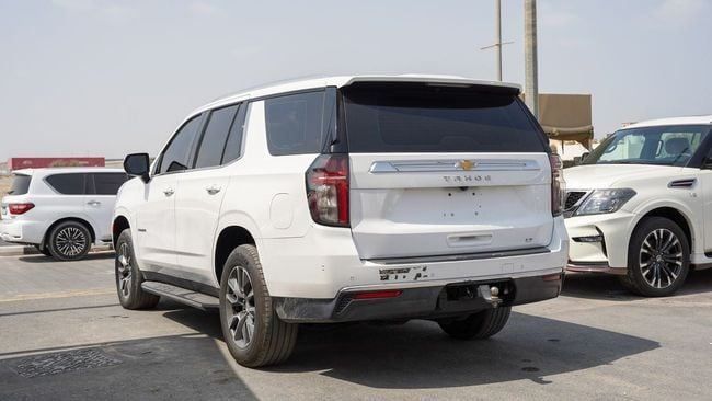 Used Chevrolet Tahoe V, 5.3 l, 2021 in Sharjah by Alnujoom Al Malakiah Used Cars, White color. GCC Specs | AUTO.AE