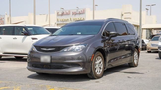 Used Chrysler Voyager VI, 3.6 l, 2023 in Sharjah by Alnujoom Al Malakiah Used Cars, Grey color. Canadian Specs | AUTO.AE