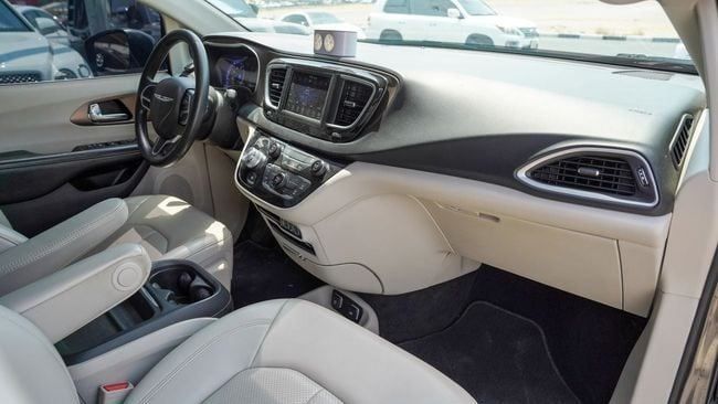 Used Chrysler Voyager VI, 3.6 l, 2023 in Sharjah by Alnujoom Al Malakiah Used Cars, Grey color. Canadian Specs | AUTO.AE